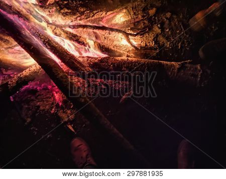 Close The Fire Flame Of Marching Fire, Super Slow Motion Of Burning Wood. Bright Bonfire With Beauti