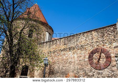 Kaptol Fortress And The Antique Rusty Clock Removed From The Zagreb Cathedral Showing 7:03 Hours The