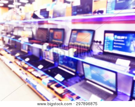 Abstract Blur Background With Mobile Store Boutique In Shopping Mall. Eletronic Department Store Int