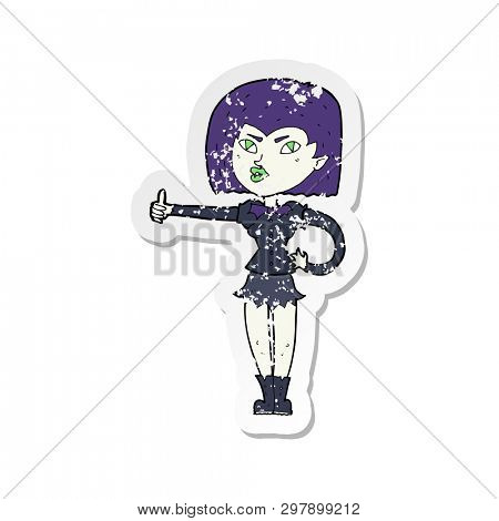 retro distressed sticker of a cartoon vampire girl giving thumbs up