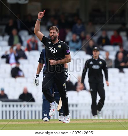 LONDON, ENGLAND. 25 APRIL 2019: Liam Plunkett of Surrey celebrates taking the wicket of Stephen Eskinazi of Middlesex during the Surrey v Middlesex, Royal London One Day Cup match at The Kia Oval. 