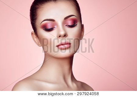 Beautiful Young Woman With Clean Fresh Skin. Perfect Makeup. Beauty Fashion. Eyelashes. Cosmetic Eye