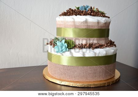 Nappy Cake Made From Nappies, Ribbons And Flower Seemed Decorations
