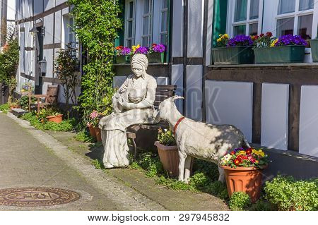 Herten-westerholt, Germany - April 01, 2019: Statue Of A Mother And Child In The Old Village Of West