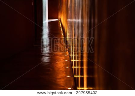 Mystery Abstract Blurry Walk Way With Tungsten Light Beside The Way.