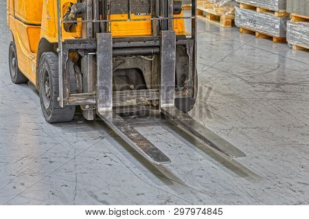 Industrial Forklift Closeup Detail In Lower Position