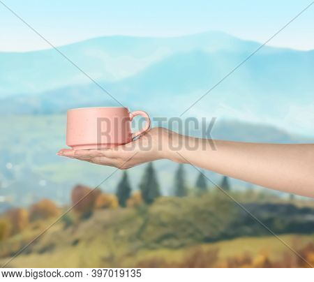 Closeness To Nature. Woman Holding Cup In Mountains, Closeup