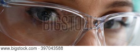 Pleased Look Female Doctor In Safety Glasses. Girl Rejoices That Her Work Is Appreciated. Improvemen