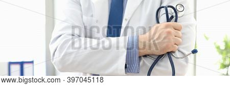 Doctor Standing In Office With Stethoscope In His Hand. Platform For Online Consultation With Doctor