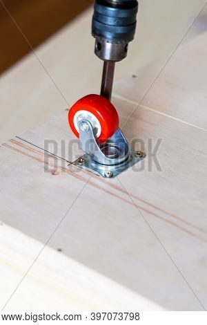 Fixing Castor Wheel To The Wooden Plywood, Furniture Making.
