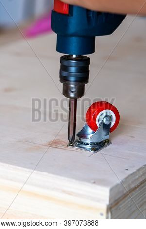Fixing Castor Wheel To The Wooden Plywood, Furniture Making.