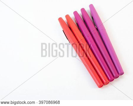 A Gradient Of Rouge With Markers. Concept Around Drawing And Creativity.