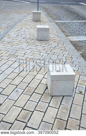 Blocking Of Traffic Against Car Entry Or Traffic Control Retracting Pillars Stone Blocks On The Road