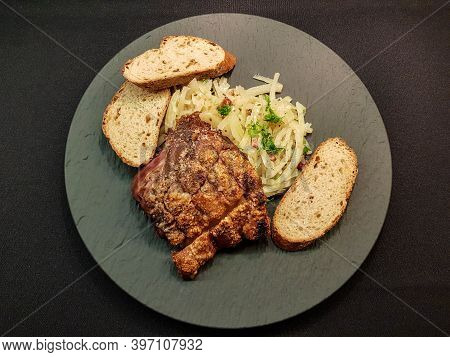 Pork Knuckle With White Cabbage And Bread