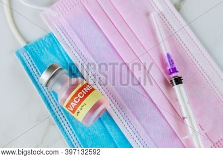 Coronavirus Vacine Bottle Sars-cov-2 Covid-19 To Fight The Coronavirus Pandemic On Medical Syringe, 