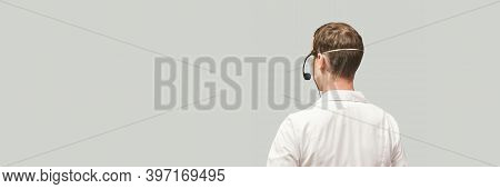 Male Doctor With Headphones. Studio Medicine Portrait. Clinic Online Help. Health Support Call. Tele
