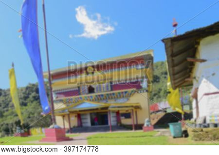 Blurred Image Of Buddhist Monastery In Himalayan Mountains At Rinchenpong, Sikkim, India