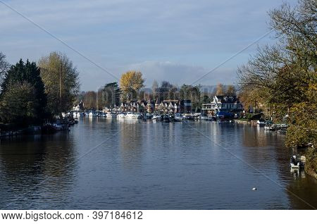 View Along The River Thames At Bourne End, Buckinghamshire On A Sunny Autumn Day.