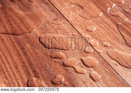 Water Drops On Wooden Board Closeup Photo