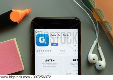 New York, Usa - 1 December 2020: Quran Pro Coran Mobile App Icon On Phone Screen Top View, Illustrat