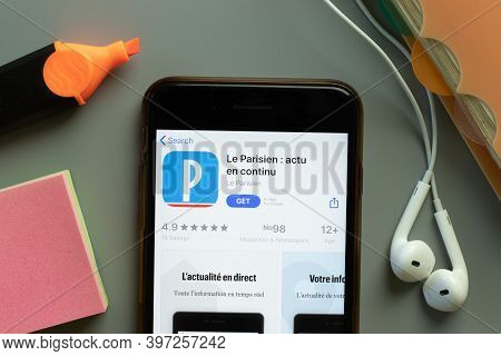 New York, Usa - 1 December 2020: Le Parisien Mobile App Icon On Phone Screen Top View, Illustrative 