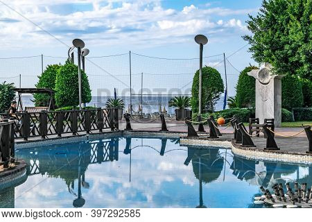 Turkey, Alanya - October 22, 2020: Pool In A Public Park Against The Background Of Kleopatra Beach A