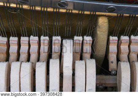 Mechanics Hammer Close Up Inside Of An Upright Piano, Inside Of An Old Piano Before Tuning.