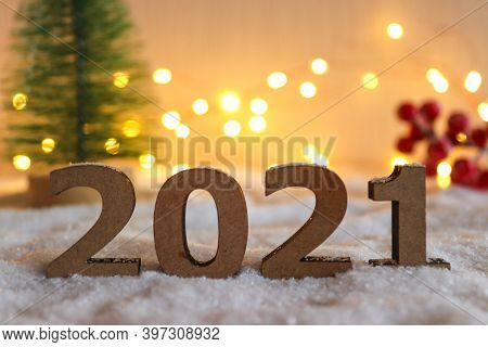 Beautiful New Year Postcard With Selective Focus. Numbers 2021 Against Festive Blurred Background Wi
