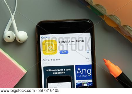 New York, Usa - 1 December 2020: Ebook Libre Illimite Mobile App Icon On Phone Screen Top View, Illu