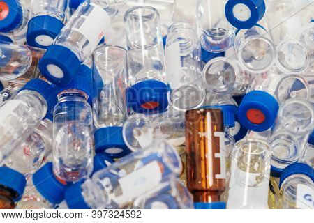 Dirty Used Chromatographic Vials With Blue Caps. Hplc Analysis At Analytical Chemistry Laboratory. D