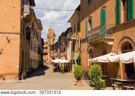 Buonconvento, Italy - September 3rd 2020. A High Street In The Historic Medieval Village Of Buonconv
