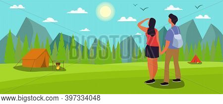 Couple Of Man And Woman Hiking Or Backpacking In Forest Or Woods In Mountains. Young Tourists Or Bac