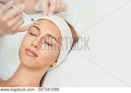 Near Eye Injection At Spa Salon. Doctor Hands. Closeup. High Quality. Pretty Female Patient. Beauty 
