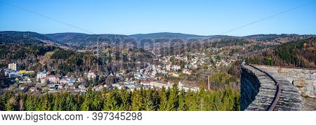 Aerial View Of Tanvald From Terezinka Lookout Point. Autumn Sunny Day. Jizera Mountains, Northern Bo