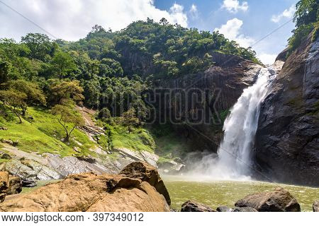 Dunhinda Waterfall In A Sunny Day In Sri Lanka