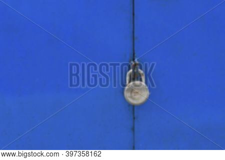 Blurred Image Of Locked Door Of A Retail Shop Under Lockdown To Stop Spread Of Corona Virus In The S