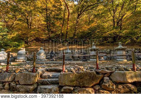 Collection Of Buddhist Stone Carved Urns
