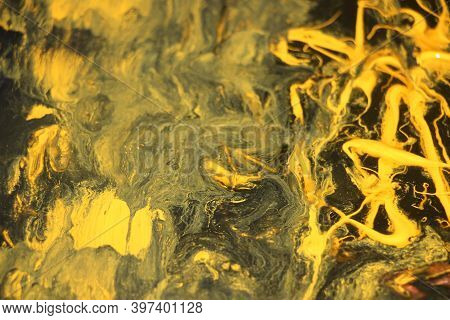 Black And Yellow Pigments Difusion Into Each Other Abstract Colorful Vivid Background