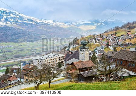 View of Triesenberg in the rain in late autumn, Liechtenstein. Triesenberg is a municipality in Liechtenstein.