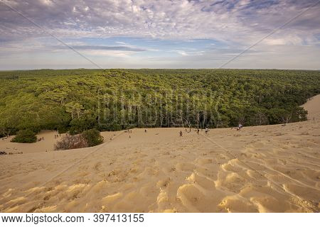 La Teste-de-buch, France - August 12, 2017: Tourists Climbing The Dune Of Pilat, The Tallest Sand Du