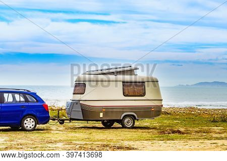 Caravan Trailer Camping On Seashore. Capicorb, Valencia Region Spain. Vacation With Mobile Home.