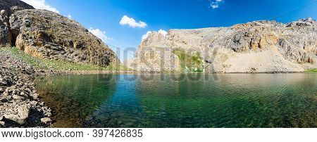 Panoramic View Of Mountain Lake Between Bolkar Mountain And Taurus Mountain. Karagol, Nigde, Turkey.