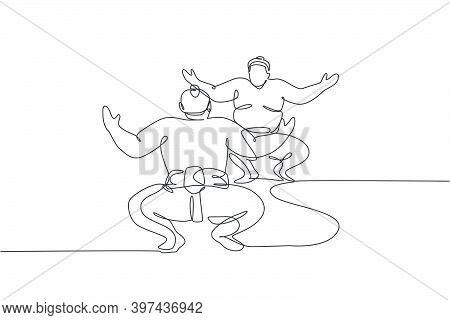 One Continuous Line Drawing Of Two Young Big Japanese Rikishi Men Prepare To Fight At Festival Tourn