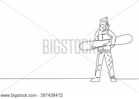 One Continuous Line Drawing Of Young Sporty Man Snowboarder Holding Snowboard In Alps Snowy Powder M