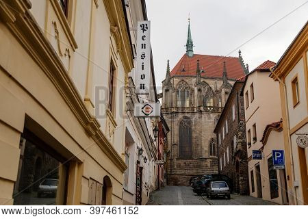 Medieval Stone St. Bartholomew´s Church, Gothic Cathedral At The End Of Narrow Street In Autumn Day,