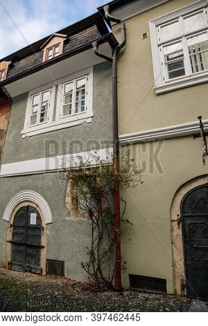Narrow Picturesque Street With Colorful Buildings In Old Historic Center In Kolin, Baroque House Wit