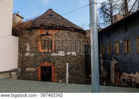 Remains Of The Outer Walls With A Bastion, Medieval Historic City Walls In Kolin In Autumn Day, Cent