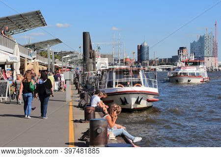 Hamburg, Germany - August 28, 2014: People Visit The Port In Hamburg. It Is The 15th Busiest Seaport