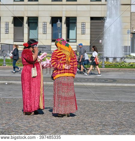 Berlin, Germany - September 18, 2020: Members Of The Roma Ethnic Group As Street Artists In The City