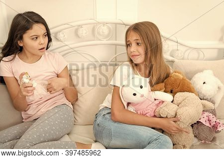 Kids Play Toys In Bed. Little Girls Spend Time Together. Teach Sister Sharing Toys. Greedy Sisters. 